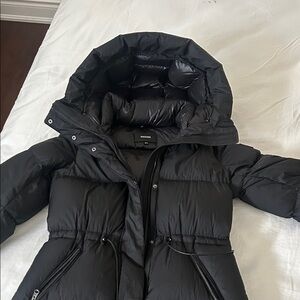 ISHANI-SW Softwash long down coat with hood
DOWN TO -20c